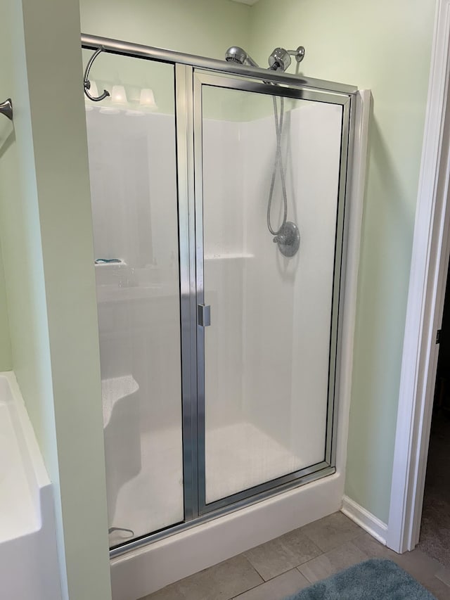 4437 Sunday Silence Way, Murfreesboro, TN 37128 - bathroom with a shower stall and tile patterned floors
