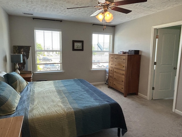 4437 Sunday Silence Way, Murfreesboro, TN 37128 - bedroom with a textured ceiling, light colored carpet, and a ceiling fan