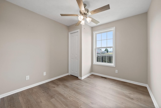 3798 Bret Dr, Clarksville, TN 37040 - unfurnished bedroom featuring wood finished floors, a closet, and ceiling fan