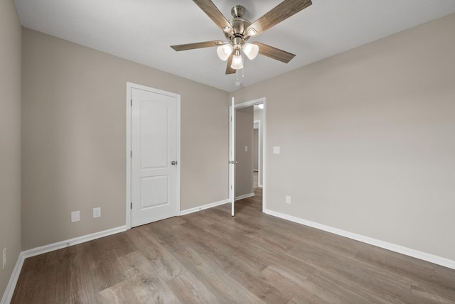 3798 Bret Dr, Clarksville, TN 37040 - unfurnished bedroom featuring wood finished floors and a ceiling fan