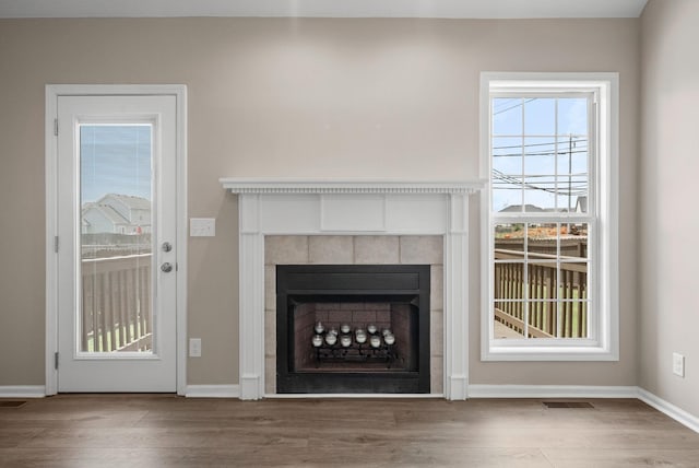 3798 Bret Dr, Clarksville, TN 37040 - detailed view of wood finished floors and a tile fireplace