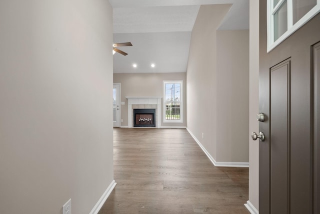 3798 Bret Dr, Clarksville, TN 37040 - unfurnished living room with a ceiling fan, wood finished floors, a fireplace, and recessed lighting