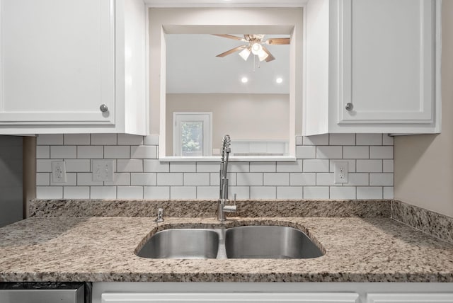 3798 Bret Dr, Clarksville, TN 37040 - kitchen featuring white cabinets, a ceiling fan, light stone counters, and tasteful backsplash