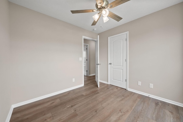 3798 Bret Dr, Clarksville, TN 37040 - unfurnished bedroom with light wood-style flooring and ceiling fan