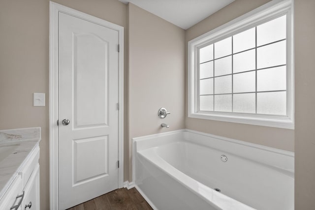 3798 Bret Dr, Clarksville, TN 37040 - full bathroom featuring a bath, vanity, and wood finished floors