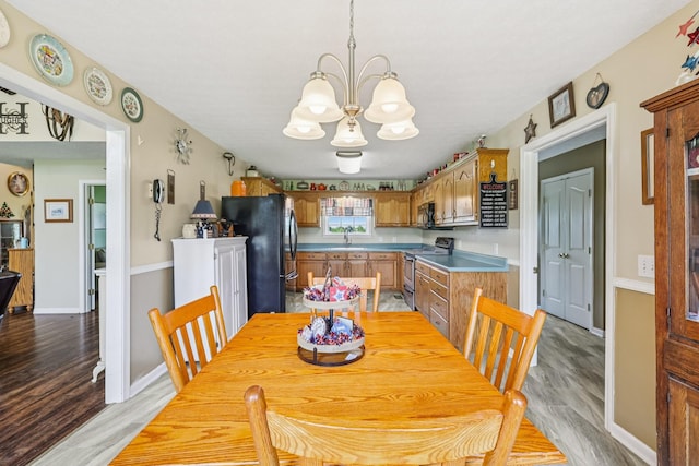 4505 Polaris Dr, Chapel Hill, TN 37034 - dining room with a chandelier and light wood finished floors