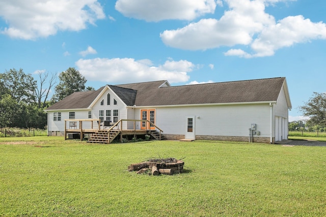 4505 Polaris Dr, Chapel Hill, TN 37034 - rear view of house featuring an outdoor fire pit, french doors, a wooden deck, a yard, and a garage