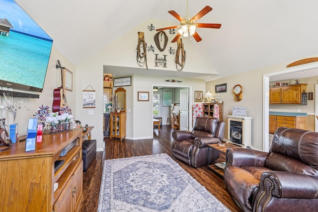 4505 Polaris Dr, Chapel Hill, TN 37034 - living area featuring ceiling fan, dark wood finished floors, high vaulted ceiling, and a glass covered fireplace