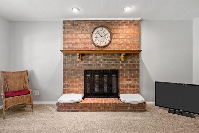 915 Rocky Hollow Rd, Erin, TN 37061 - living area with carpet, a fireplace, and recessed lighting