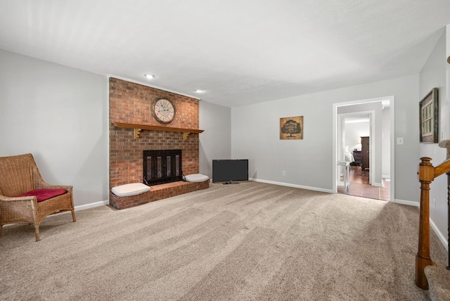 915 Rocky Hollow Rd, Erin, TN 37061 - unfurnished living room with carpet floors, a brick fireplace, and recessed lighting