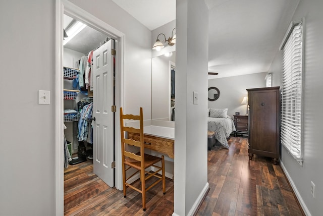 915 Rocky Hollow Rd, Erin, TN 37061 - hallway with dark wood finished floors and baseboards