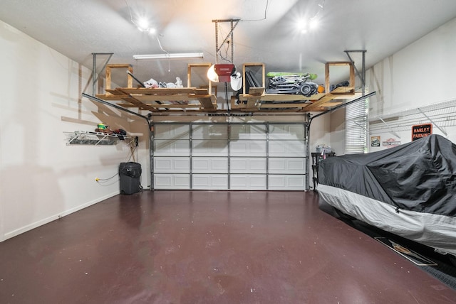 915 Rocky Hollow Rd, Erin, TN 37061 - garage featuring baseboards