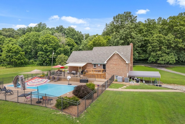 915 Rocky Hollow Rd, Erin, TN 37061 - view of swimming pool featuring a water slide, a patio area, and a deck