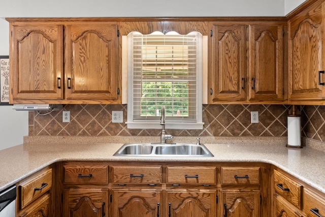 915 Rocky Hollow Rd, Erin, TN 37061 - kitchen featuring brown cabinets, tasteful backsplash, and light countertops