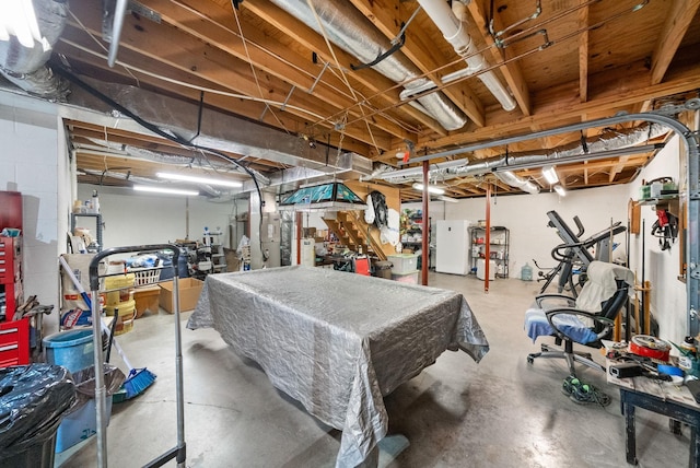 915 Rocky Hollow Rd, Erin, TN 37061 - unfinished basement featuring freestanding refrigerator and pool table