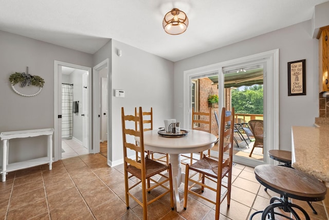 915 Rocky Hollow Rd, Erin, TN 37061 - dining space with light tile patterned flooring and baseboards