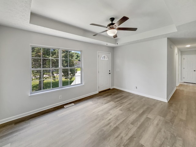 147 Greystone Dr, Springfield, TN 37172 - entryway with a raised ceiling, a ceiling fan, and wood finished floors