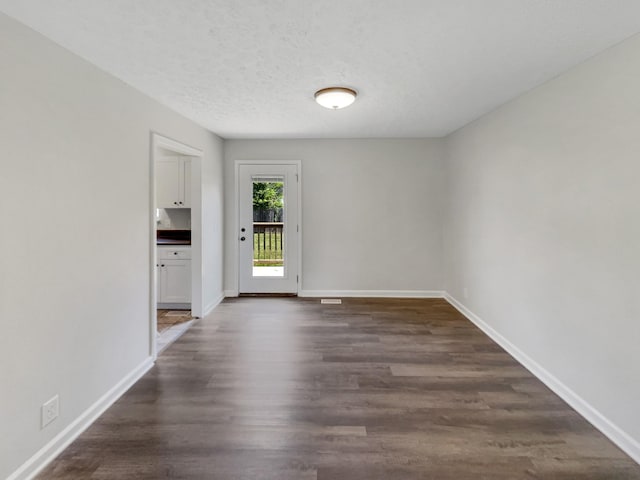 147 Greystone Dr, Springfield, TN 37172 - unfurnished room featuring dark wood finished floors and baseboards