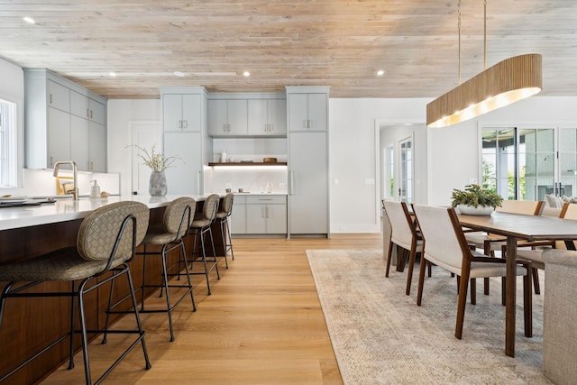 6315 Callie Ln, Brentwood, TN 37027 - dining room featuring light wood-style flooring, recessed lighting, and wood ceiling