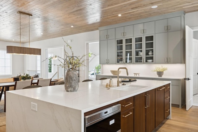 6315 Callie Ln, Brentwood, TN 37027 - kitchen with plenty of natural light, a center island with sink, wooden ceiling, light wood-type flooring, and recessed lighting