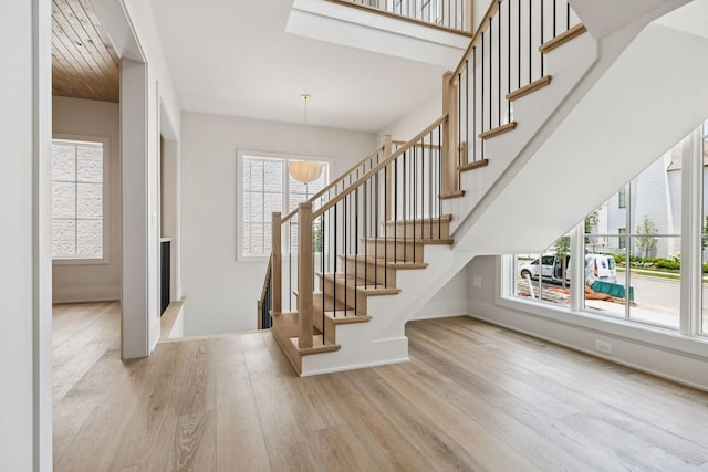 6315 Callie Ln, Brentwood, TN 37027 - foyer entrance with wood finished floors, stairs, and a chandelier
