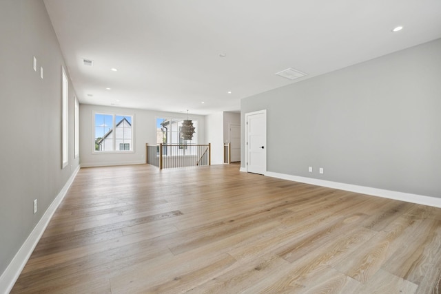 6315 Callie Ln, Brentwood, TN 37027 - spare room with light wood-style flooring, a chandelier, and recessed lighting