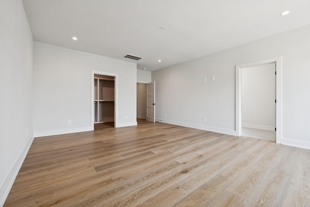 6315 Callie Ln, Brentwood, TN 37027 - unfurnished bedroom featuring a spacious closet, light wood-type flooring, and recessed lighting