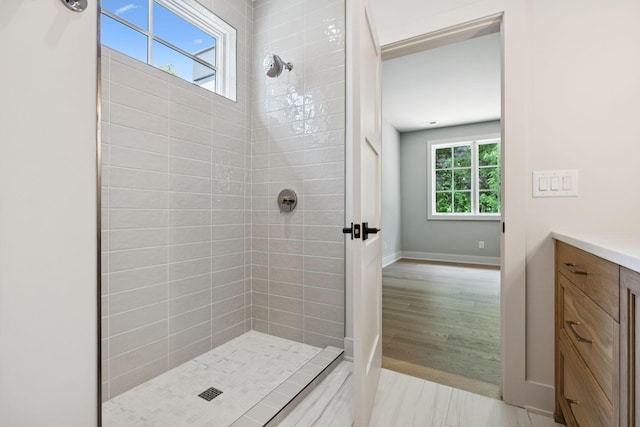 6315 Callie Ln, Brentwood, TN 37027 - full bathroom featuring tiled shower, vanity, and wood finished floors
