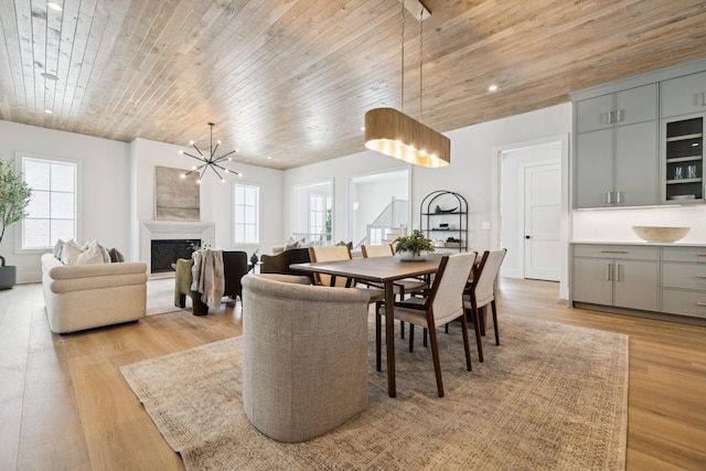 6315 Callie Ln, Brentwood, TN 37027 - dining room featuring healthy amount of natural light, wooden ceiling, light wood-style flooring, and a chandelier