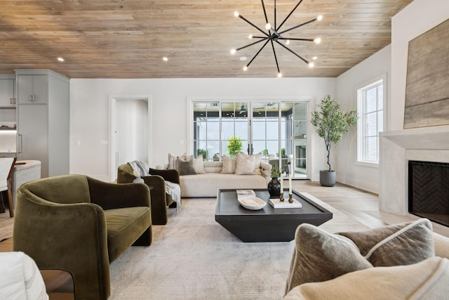 6315 Callie Ln, Brentwood, TN 37027 - living room featuring wooden ceiling, a chandelier, a high end fireplace, parquet floors, and recessed lighting