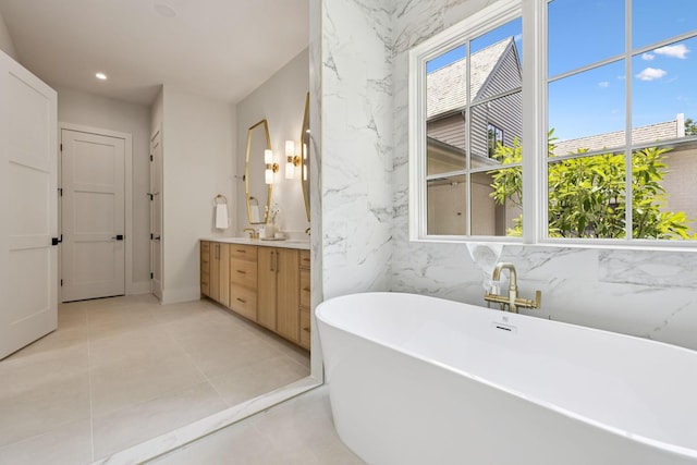 6315 Callie Ln, Brentwood, TN 37027 - full bathroom with vanity, a freestanding bath, and recessed lighting