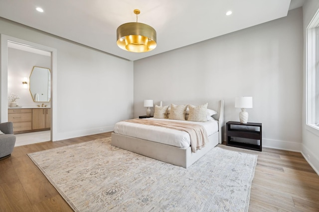 6315 Callie Ln, Brentwood, TN 37027 - bedroom with light wood-style flooring, connected bathroom, and recessed lighting