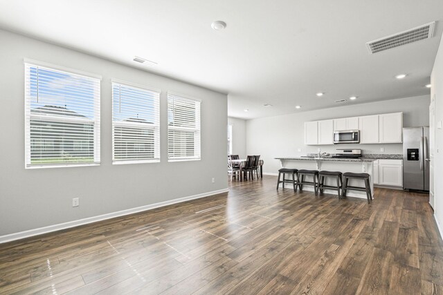 830 Long Leaf Rd, Lebanon, TN 37087 - kitchen with appliances with stainless steel finishes, recessed lighting, white cabinetry, plenty of natural light, and dark wood-style floors