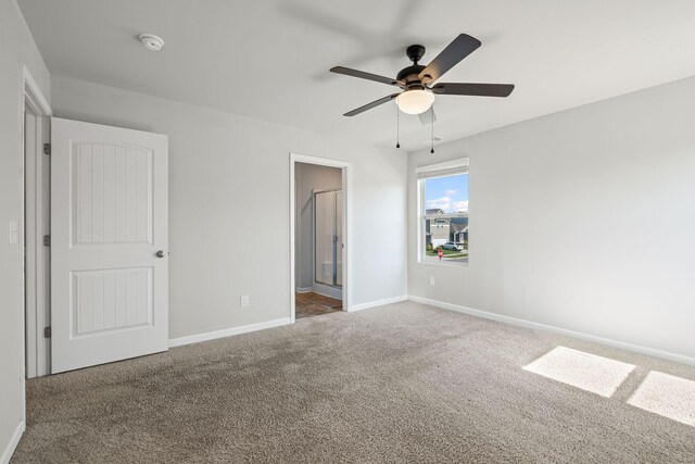 830 Long Leaf Rd, Lebanon, TN 37087 - unfurnished bedroom featuring carpet flooring, connected bathroom, and a ceiling fan