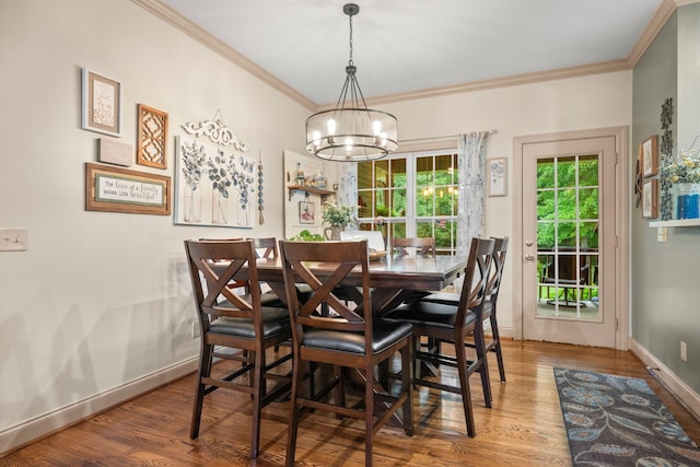 116 Sherrolyn Ct, Burns, TN 37029 - dining area with a chandelier, ornamental molding, and wood finished floors