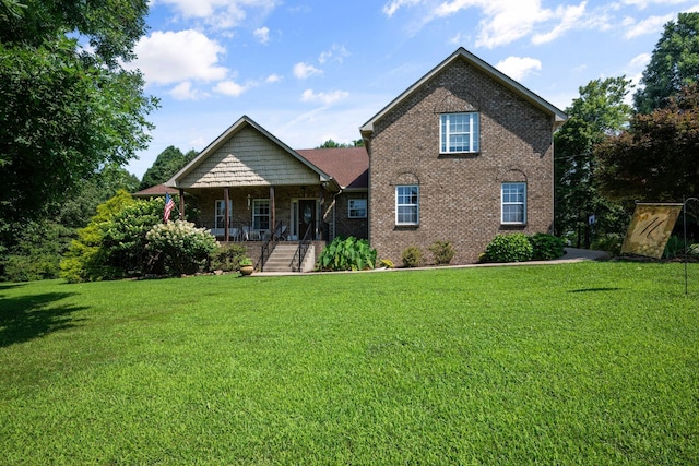 116 Sherrolyn Ct, Burns, TN 37029 - view of front of property with covered porch, brick siding, and a front lawn