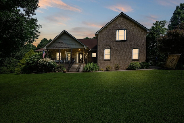 116 Sherrolyn Ct, Burns, TN 37029 - view of front of house featuring a front lawn, a porch, and brick siding