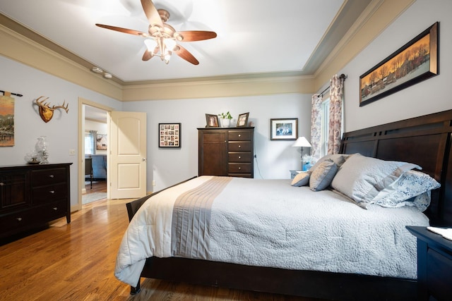 116 Sherrolyn Ct, Burns, TN 37029 - bedroom featuring wood finished floors, crown molding, and ceiling fan