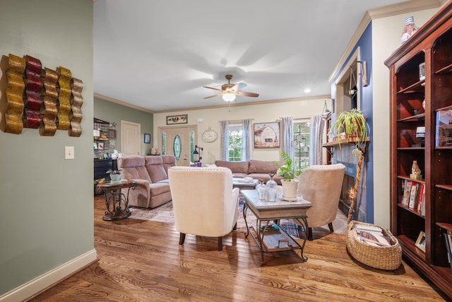 116 Sherrolyn Ct, Burns, TN 37029 - living area with wood finished floors, ceiling fan, and ornamental molding