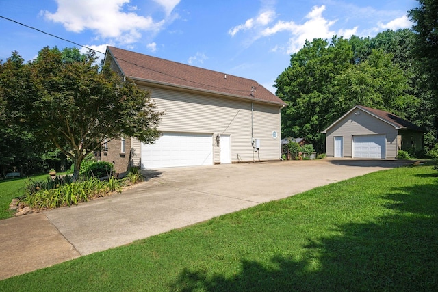 116 Sherrolyn Ct, Burns, TN 37029 - view of home's exterior featuring a yard, an outbuilding, and a garage