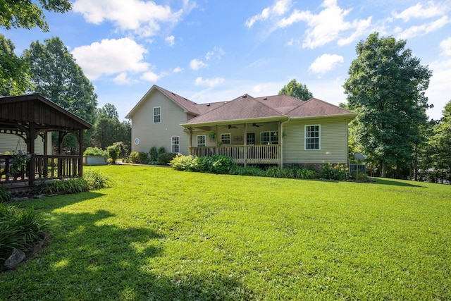 116 Sherrolyn Ct, Burns, TN 37029 - rear view of property featuring a ceiling fan, a yard, and a gazebo
