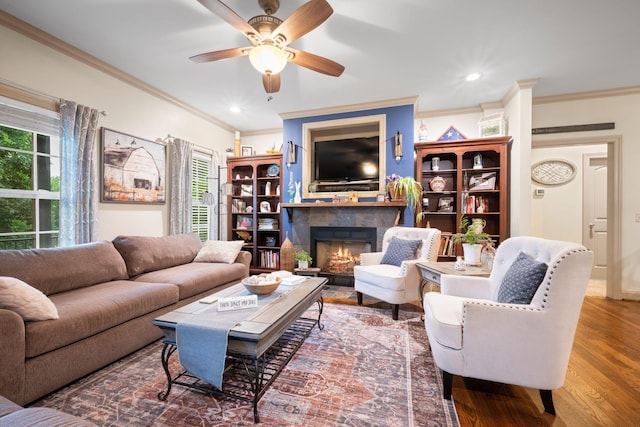116 Sherrolyn Ct, Burns, TN 37029 - living area featuring ornamental molding, ceiling fan, wood finished floors, healthy amount of natural light, and recessed lighting