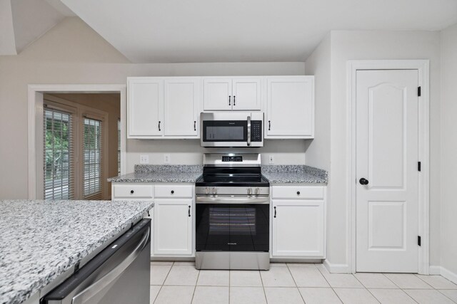 3455 Esquire Dr, Murfreesboro, TN 37130 - kitchen with stainless steel appliances, light tile patterned floors, white cabinetry, and light stone counters