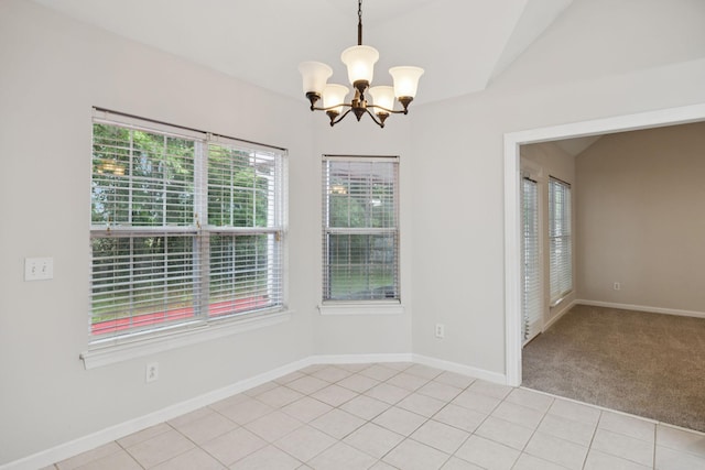 3455 Esquire Dr, Murfreesboro, TN 37130 - unfurnished dining area with plenty of natural light, a chandelier, light tile patterned flooring, vaulted ceiling, and light colored carpet
