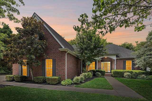 3455 Esquire Dr, Murfreesboro, TN 37130 - view of front of home with brick siding, a lawn, and a shingled roof
