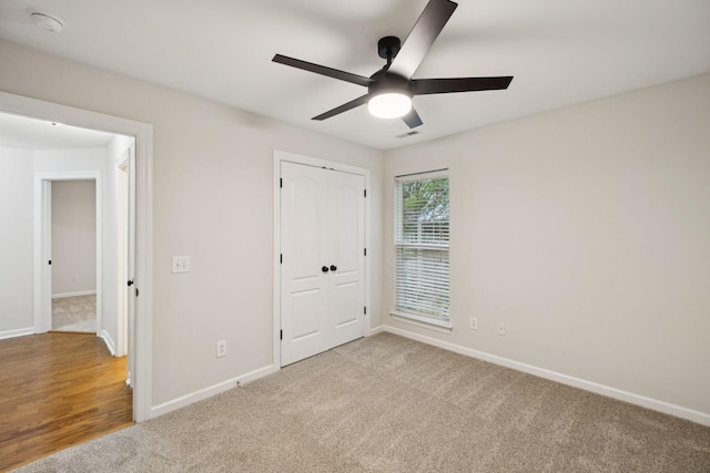 3455 Esquire Dr, Murfreesboro, TN 37130 - unfurnished bedroom with carpet floors, a closet, and a ceiling fan