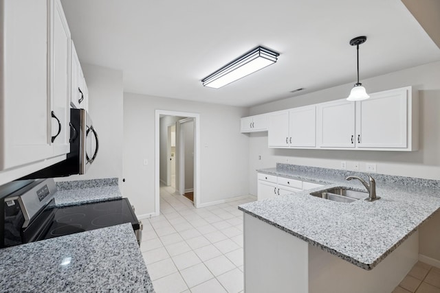 3455 Esquire Dr, Murfreesboro, TN 37130 - kitchen featuring electric range, a peninsula, and white cabinetry