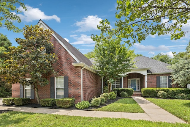 3455 Esquire Dr, Murfreesboro, TN 37130 - traditional-style home featuring brick siding, a front yard, and a shingled roof