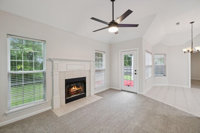 3455 Esquire Dr, Murfreesboro, TN 37130 - unfurnished living room with light colored carpet, a chandelier, a tile fireplace, ceiling fan, and light tile patterned flooring