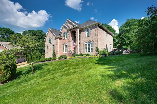 9732 Turnbridge Ct, Brentwood, TN 37027 - view of front of home featuring a front lawn and brick siding